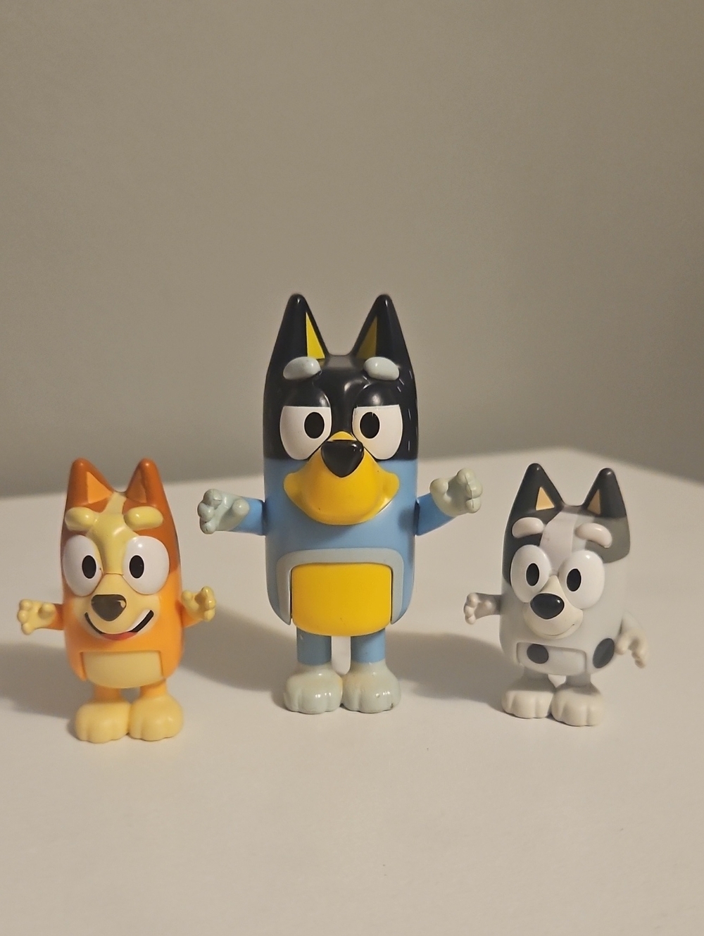 Three-Piece Blue, Orange & Gray Cartoon Dog Figurine Set